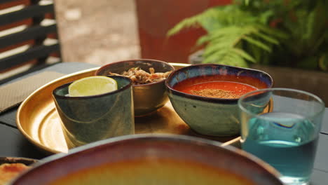outdoor meal with spices and sauces