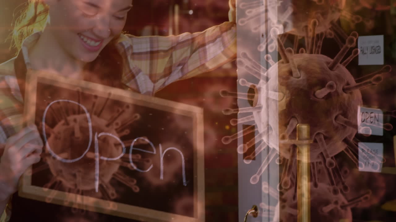 열린 표지판을 들고 있는 백인 여성 위에 떠다니는 거대한 코로나19 세포의 애니메이션