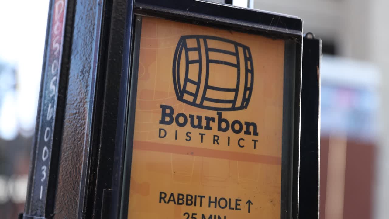 Tight shot of a sign featuring the word “Bourbon” in Louisville, Kentucky. Highlights the city’s deep ties to whiskey culture and tourism