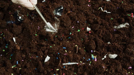 cleaning up plastic and other debris from soil