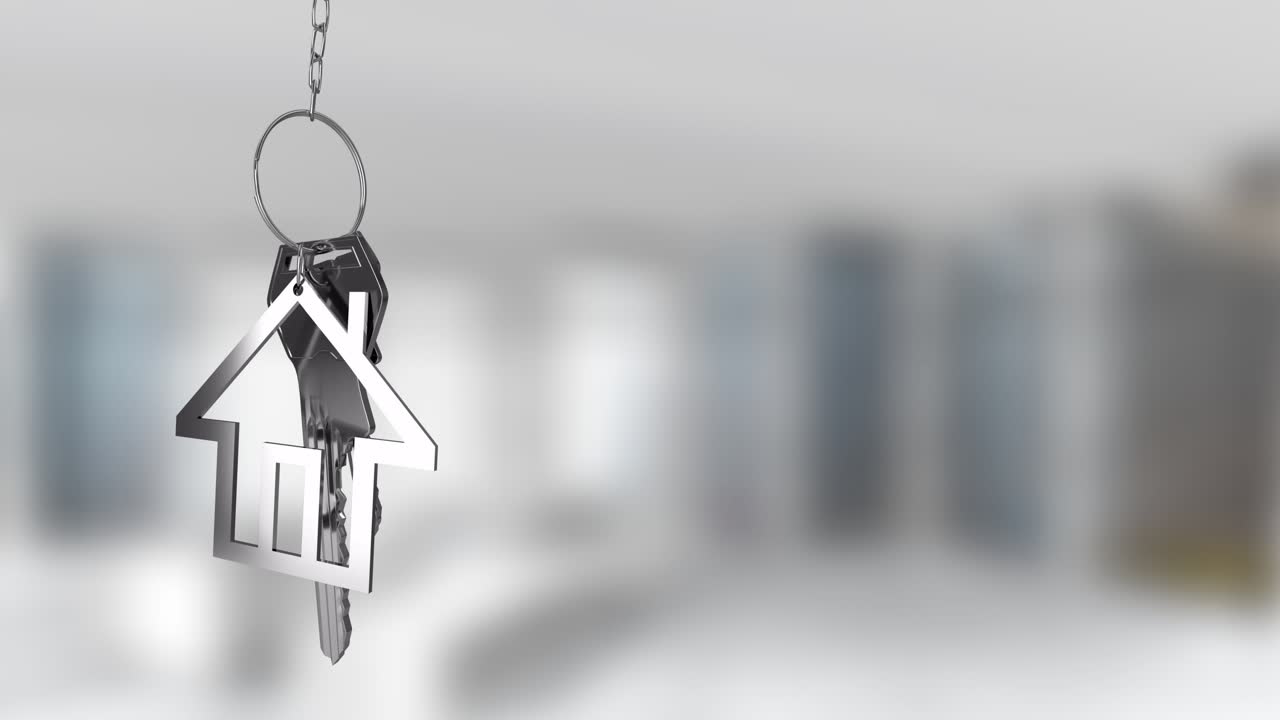 Bulanık arka plan üzerinde anahtarları tutan ev şeklinde anahtarlık.