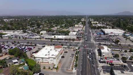 sherman oaks cityscape roads in los angeles suburb, california 4k aerial view