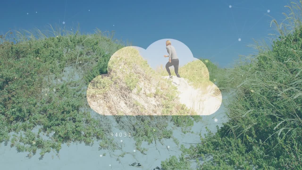 Man walking on sandy hill with pixelated animation overlaying scene