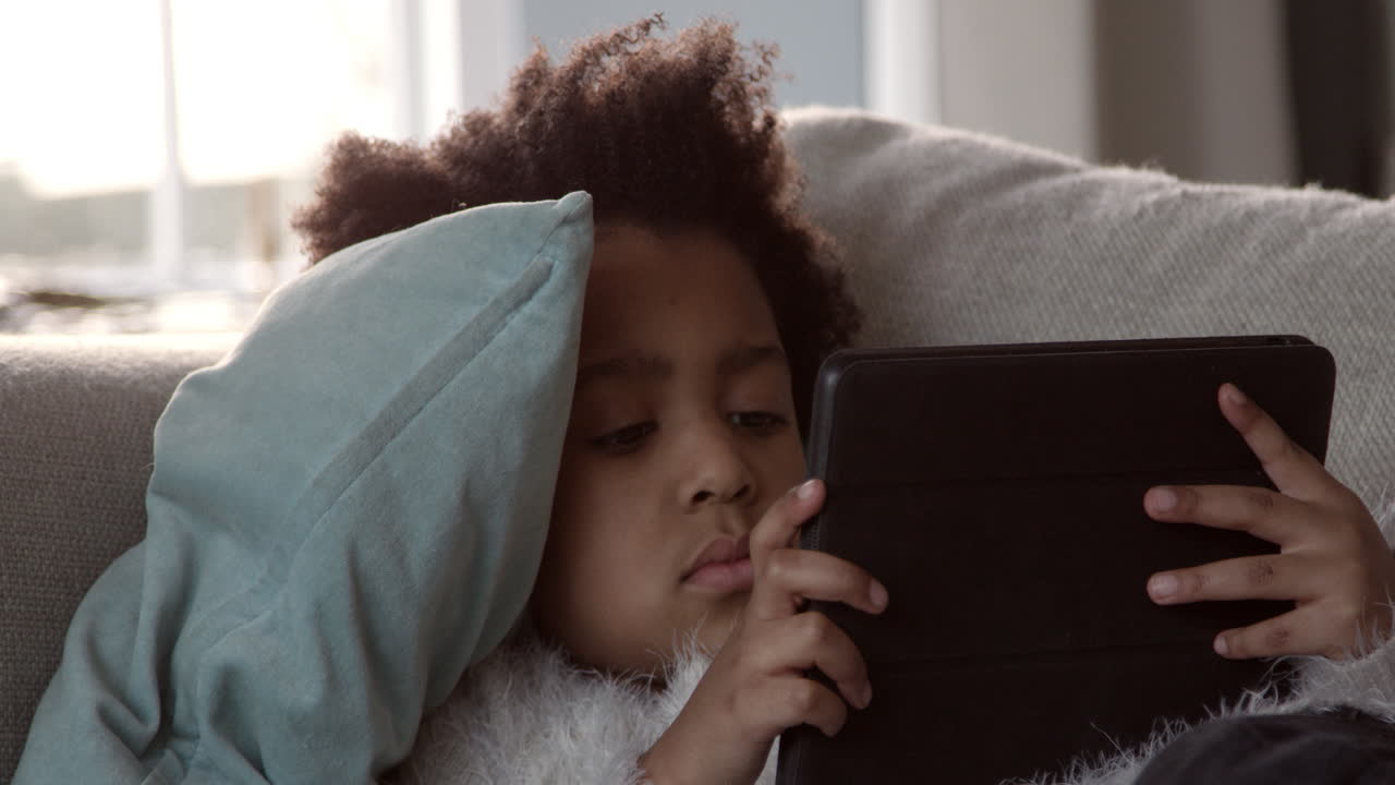 Girl Playing With Digital Tablet At Home Shot On R3D