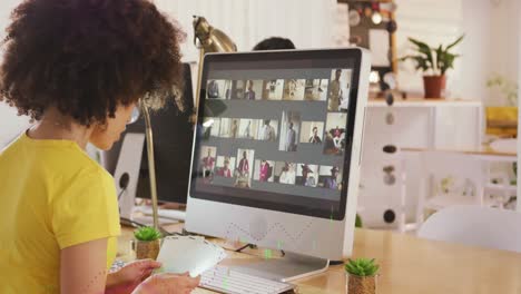 Composite-of-financial-data-processing-over-businesswoman-using-computer-in-office