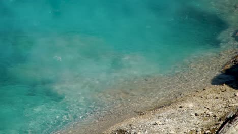 beautiful deep turquoise pools at the grand prismatic hot springs in yellowstone national park