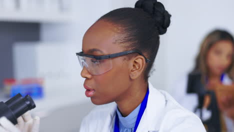 science, microscope and research with a doctor