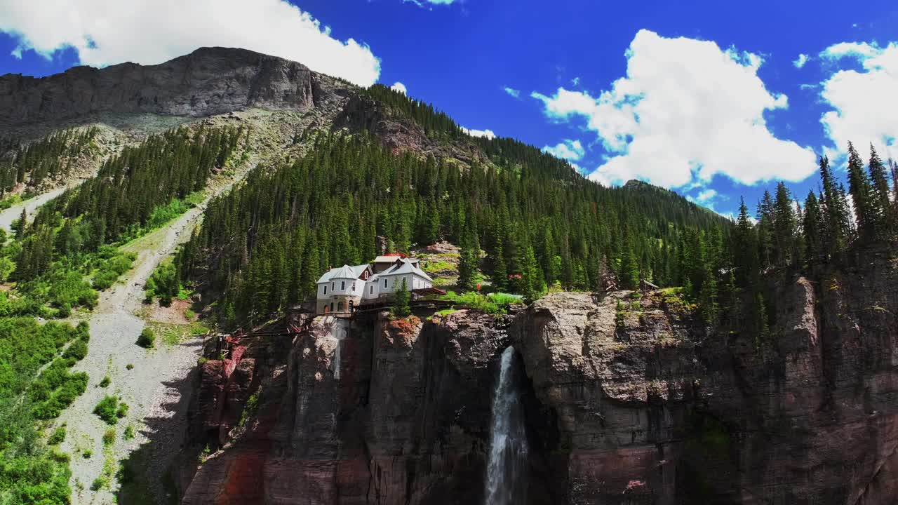Stunning Waterfall and Cliffside House in the Colorado Mountains