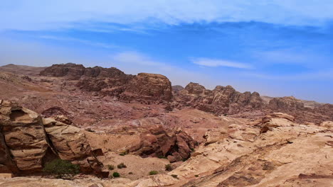 rocks in the dry hot desert. view on the stunning landscape of jordan, west asia from top of the mountain.
