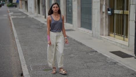 woman walking down a city street