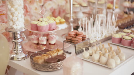 cute candy bar with various cakes and candies wedding candybar 2