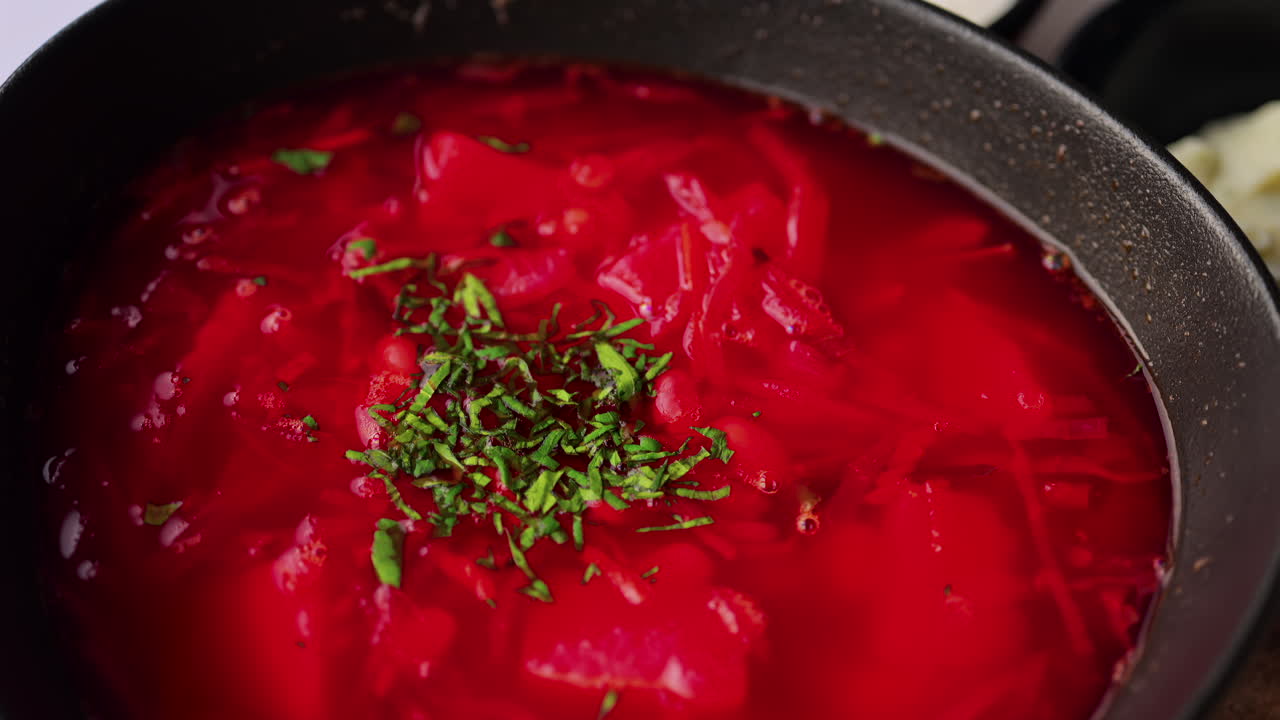 Close up of a bowl of borscht at a restaurant