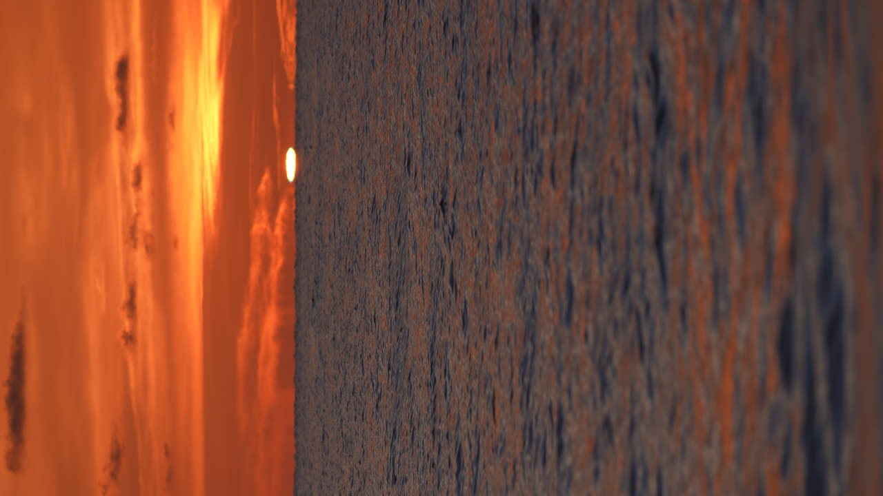 Vertical Shot Of Beautiful Seaside Sunset With Golden Sky, Green Flash Phenomenon In Naples Florida