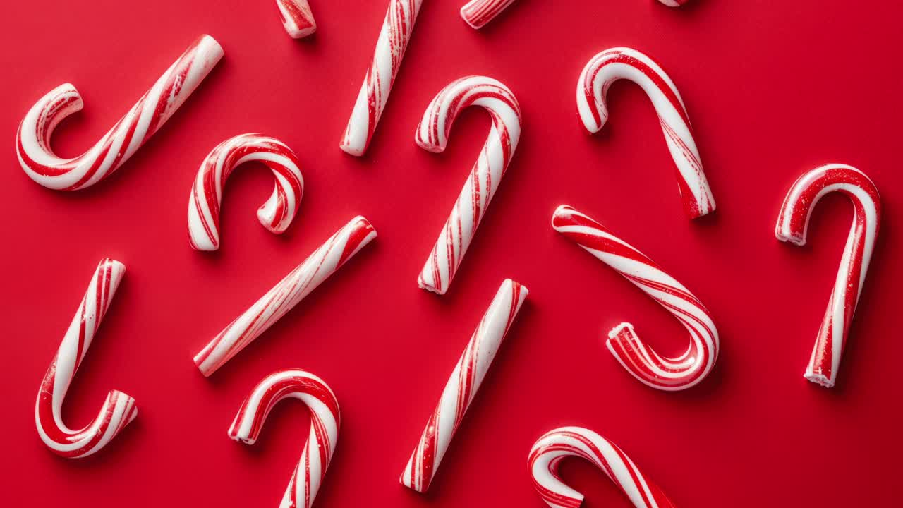 Permen Tongkat Natal dengan Latar Belakang Merah