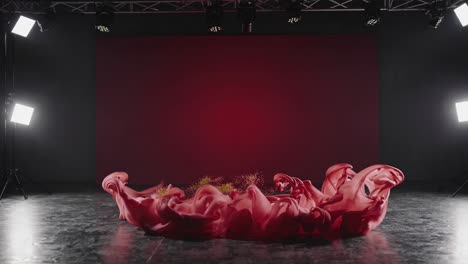 pink ink explosion in a studio setting