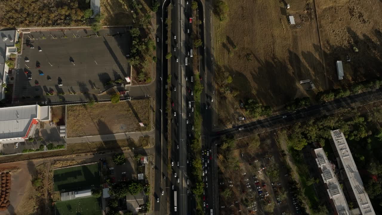 DRONE: REVEAL SHOT OF EL CUATRO HILL IN GUADALAJARA, JALISCO AT A SUNNY DAY