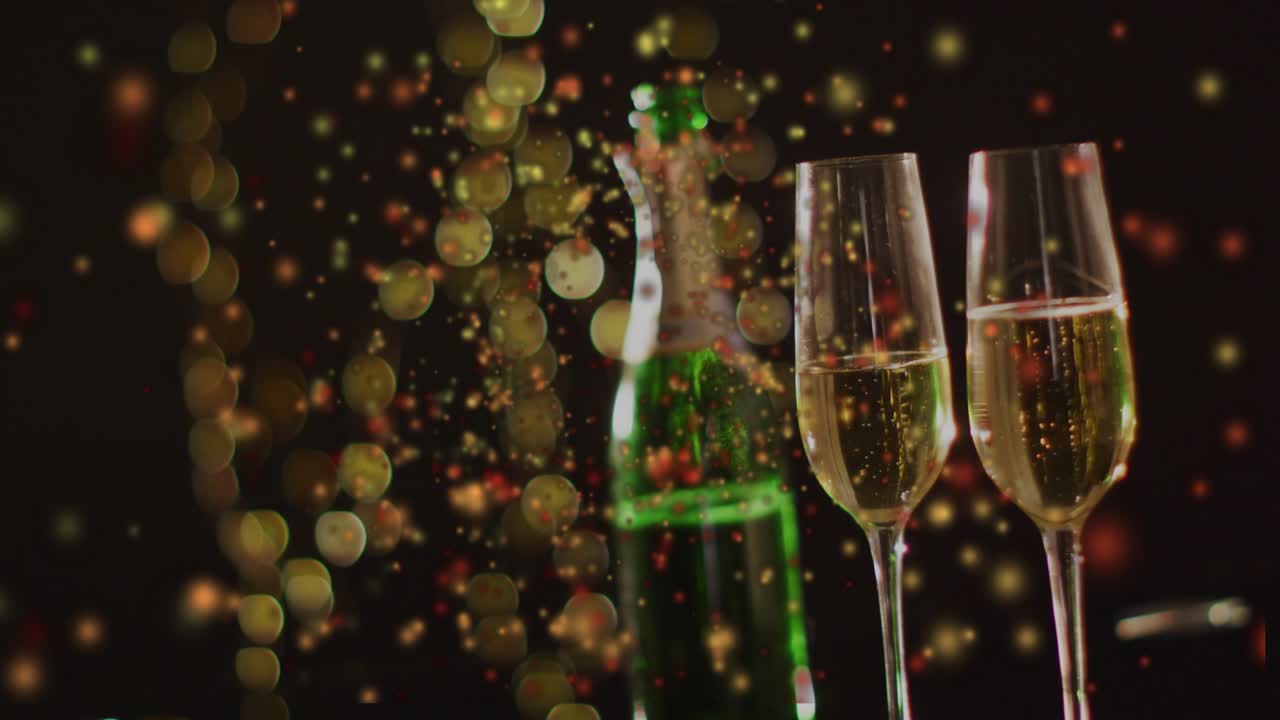 Gold particles rising left of green bottle, two flutes drifting toward glasses forming festive glow
