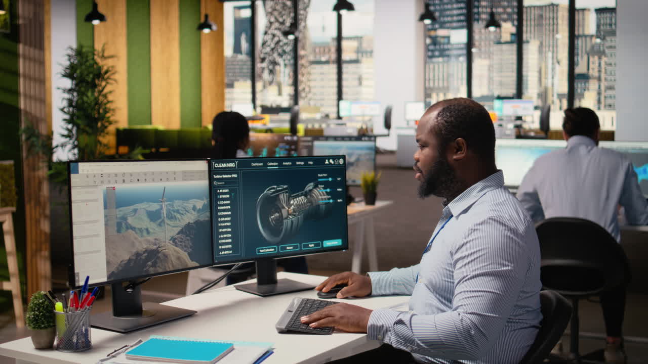 Technician Using Cad Software To Optimize Wind Turbine Blade Aerodynamics