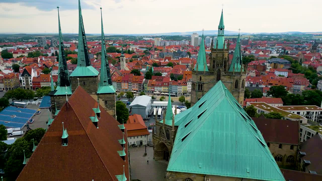 4K Aerial Drone Video of the Copper-clad Spiers of St. Severi Church and Erfurt Cathedral in Downtown Erfurt, Germany