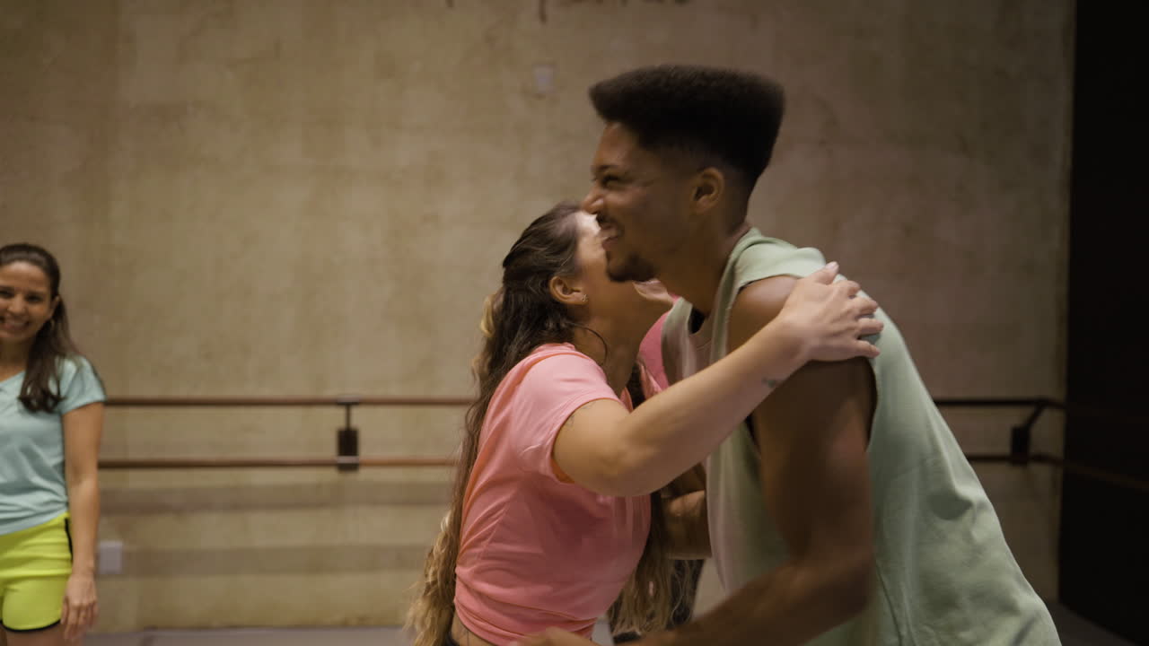 Group of people interacting in a fitness studio
