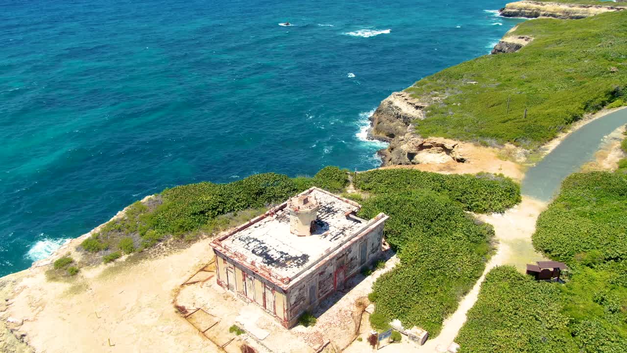 Aerial View of a Ruined Lighthouse on a Caribbean Coast