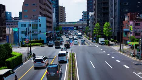 a timelapse of the traffic jam at the urban street in tokyo long shot