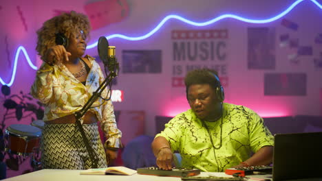 music production session in a colorful studio