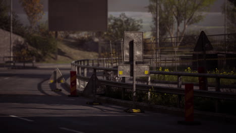 road under construction with traffic signs and barriers in a quiet area