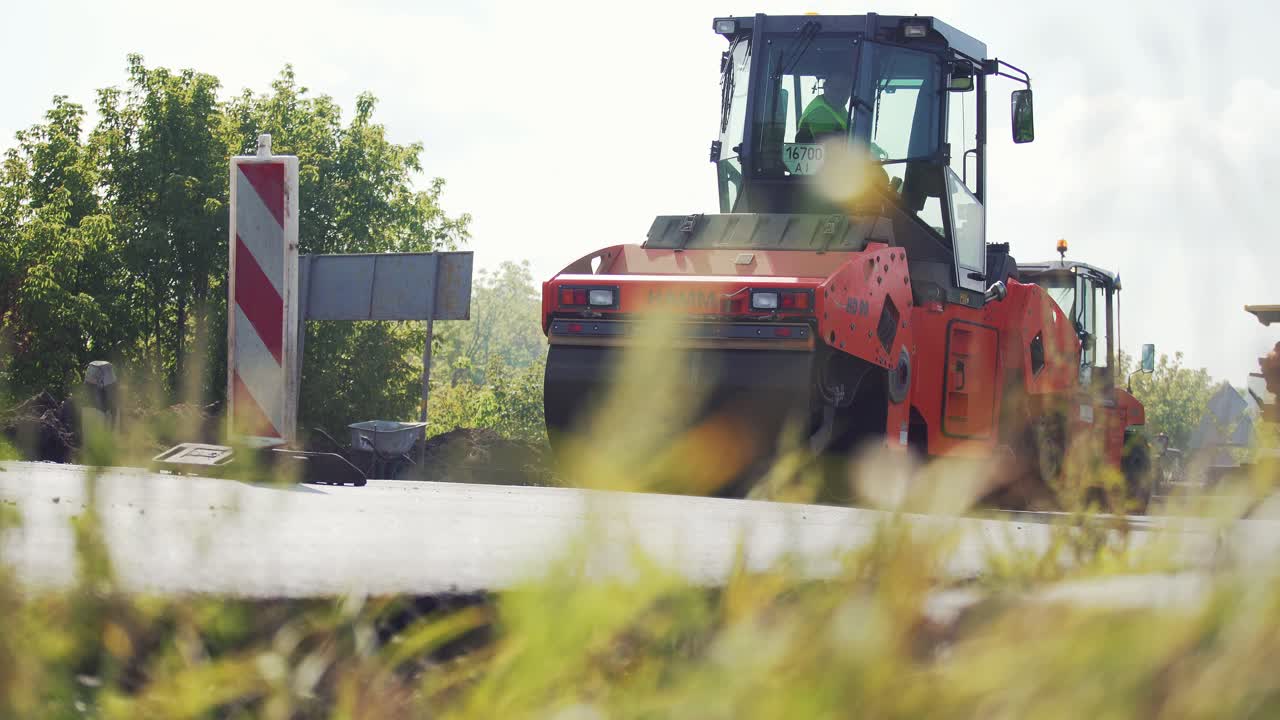 VINNYTSIA, UKRAINE - SEPTEMBER 10, 2018: Road roller doing road repair. Building A New Road