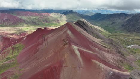 aerial fly drone view of rainbow mountain , vinicunca, cusco region, peru