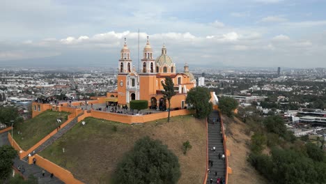 aerial view of cholula pyramid and church at noon