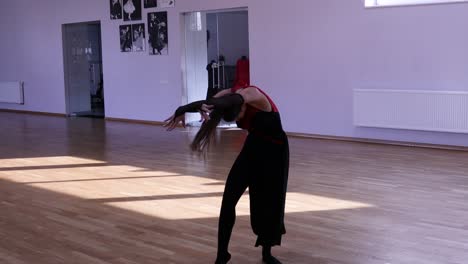 Female-dancer-warming-up-before-dancing