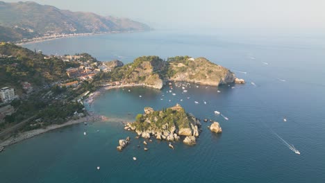 beautiful drone shot above isola bella near taormina, sicily