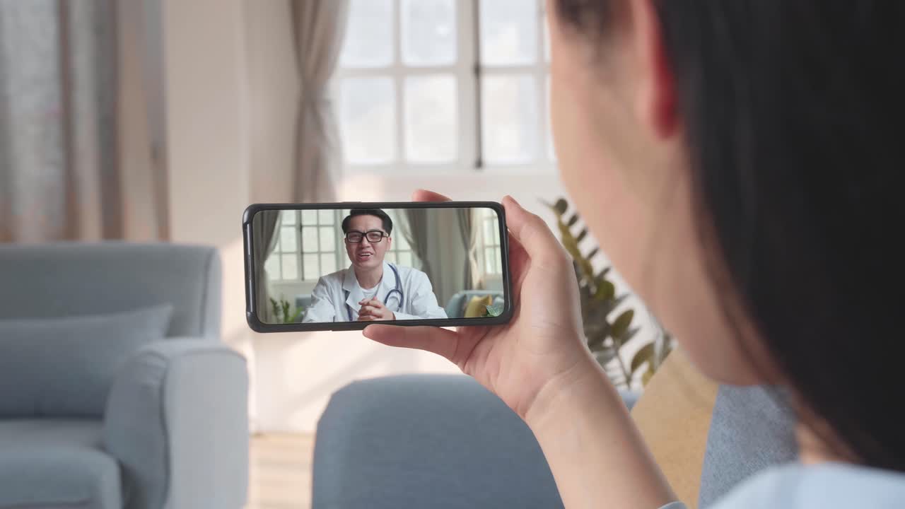 Woman Video Call With Doctor On Mobile Phone, Video In 4K