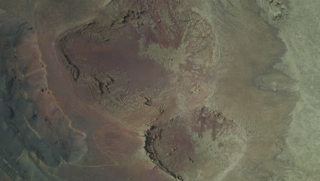 aerial overhead view of the arena volcano crater on the island of fuerteventura in a desert landscape