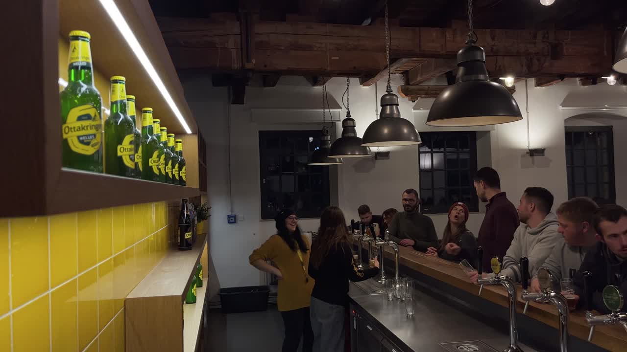 Friends taste many sort of beer at oettinger brewery taverna