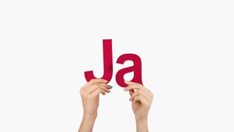 woman hand holding letters j and a