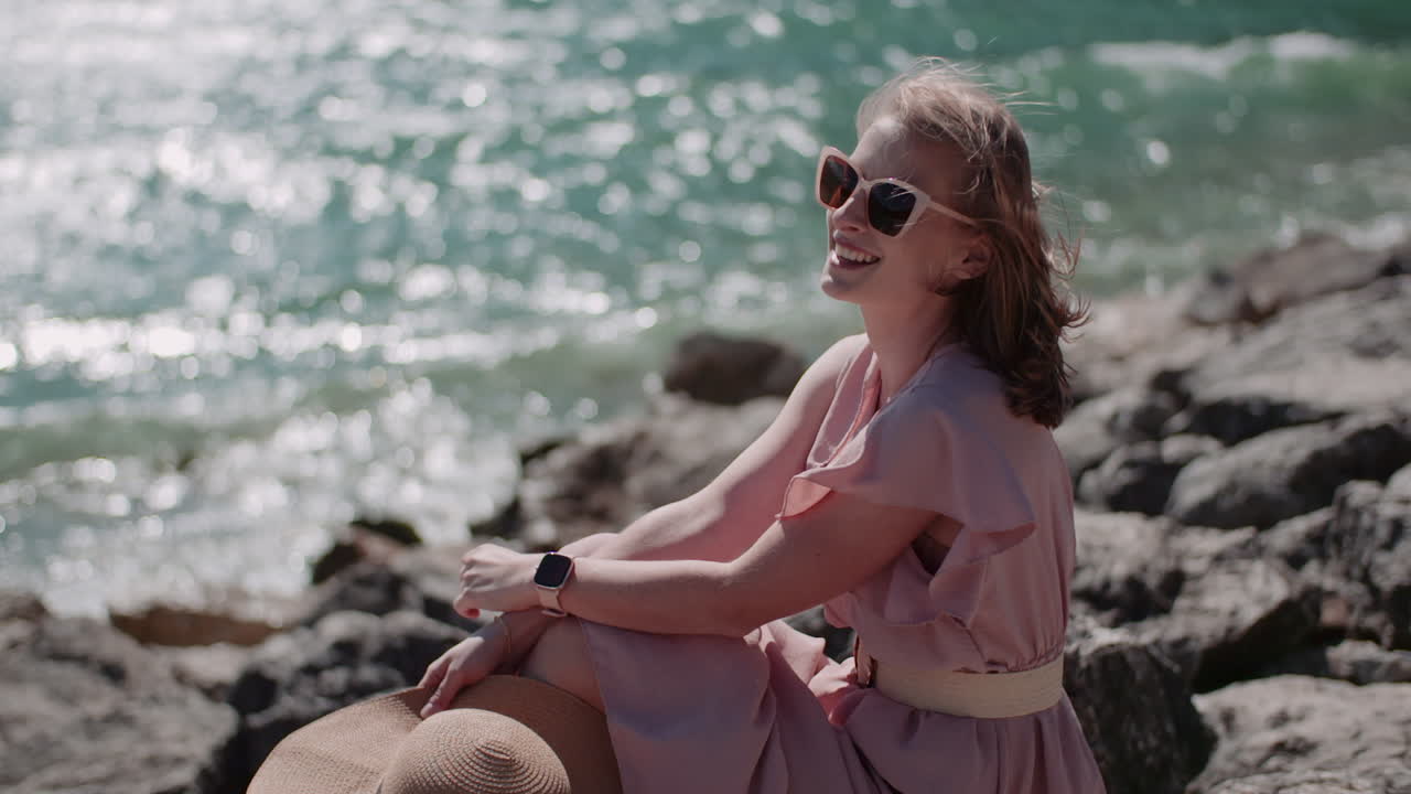 Smiling Woman by Seaside with Blue Water
