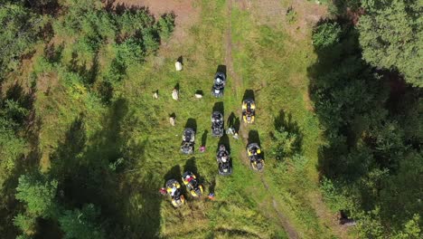 aerial view of atv group in forest