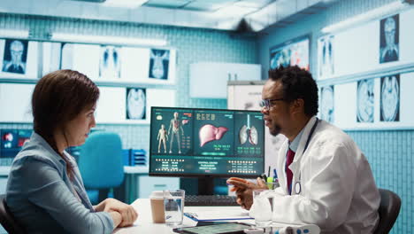 african american medic doing a scan interpretation with female patient