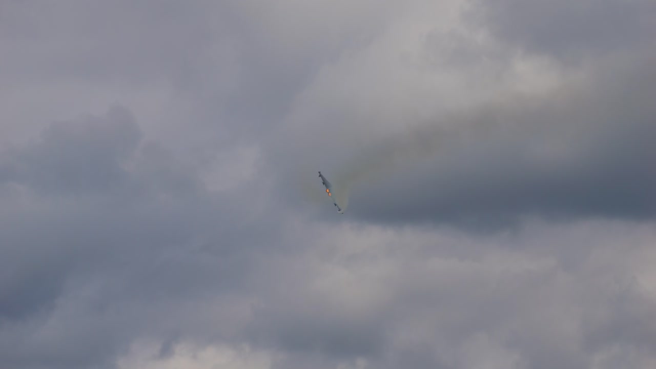 Eurofighter military fighter aircraft turns at full speed. You can see the afterburner. Recorded in slow motion at Airpower 2024