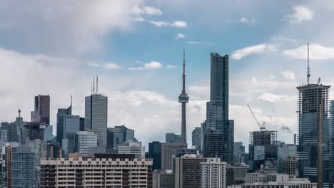 modern toronto city skyline clouds and sunshine