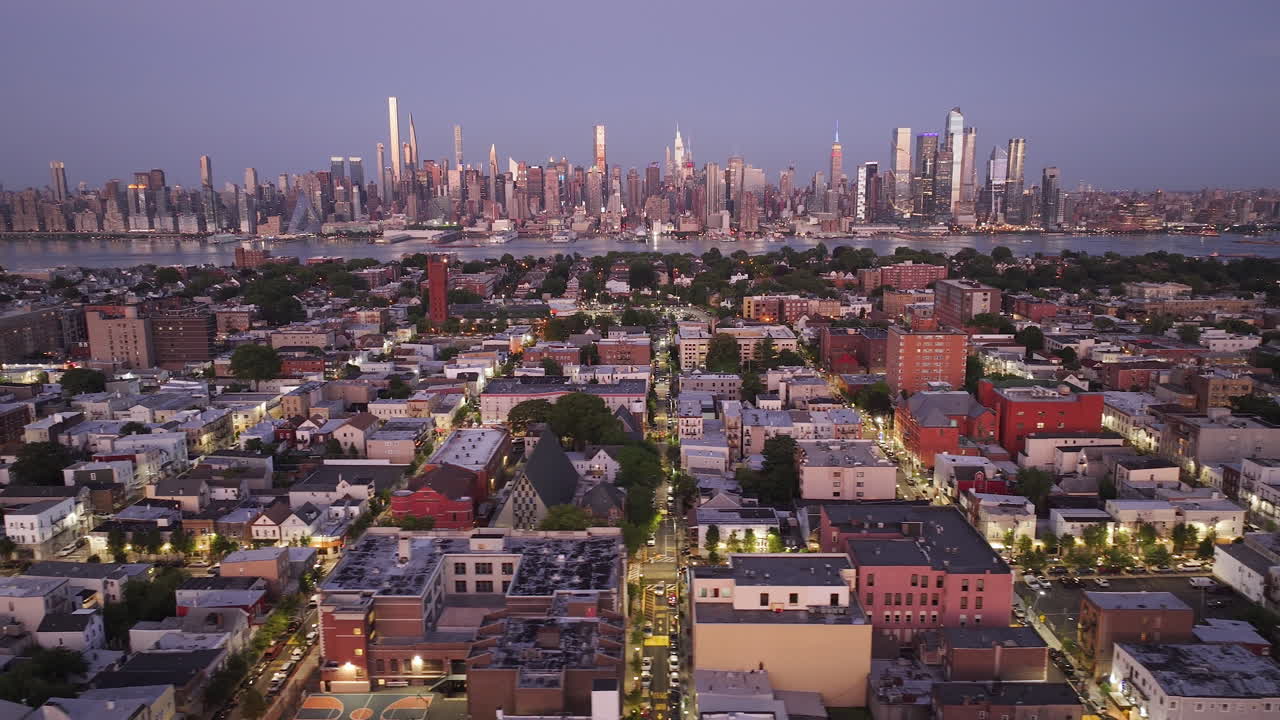 Aerial view of Midtown Manhattan at night. Shot in New Jersey