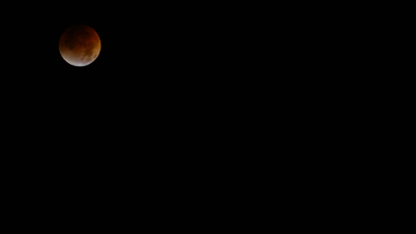 lapso de tiempo de un eclipse lunar con la luna moviéndose a través del marco 1