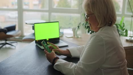 senior woman working at home