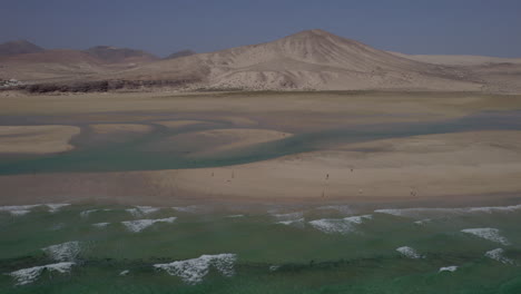 sotavento beach, fuerteventura: wonderful aerial view in orbit of the fantastic beach on a sunny and hazy day