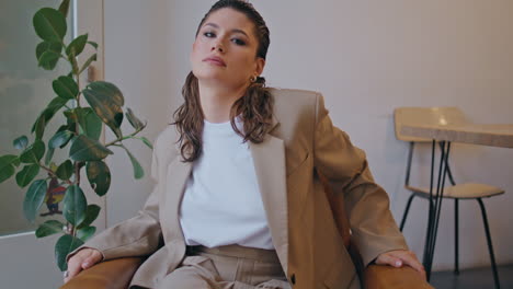 woman business owner posing in luxury office lobby closeup. elegant lady boss