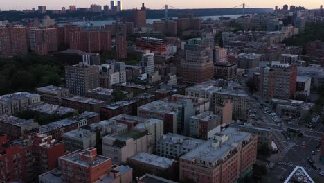 aerial flight over the manhattanville part of harlem, nyc, smooth turning towards morningside park, at daybreak