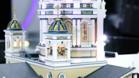 detailed architectural model of a church with bell tower and dome