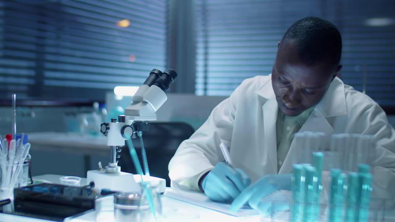African American Scientist Doing Research in Laboratory